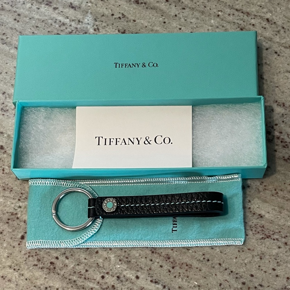 Tiffany & Co. black snap loop key ring. Brand new! Comes with box, ribbon & bag